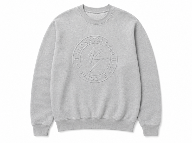 Grey KlosetSlayer sweatshirt with tonal embossed crest, front view
